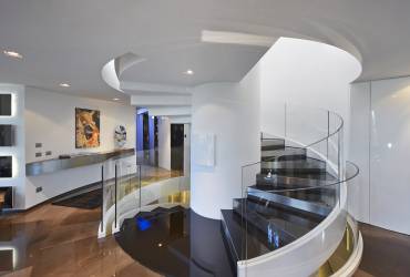 Exquisite villa.  Contemporary glass stairs.