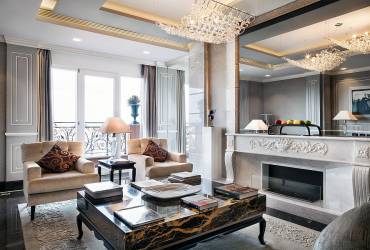 Luxury penthouse, exclusive suit at Baglioni Hotel, stylish living room.