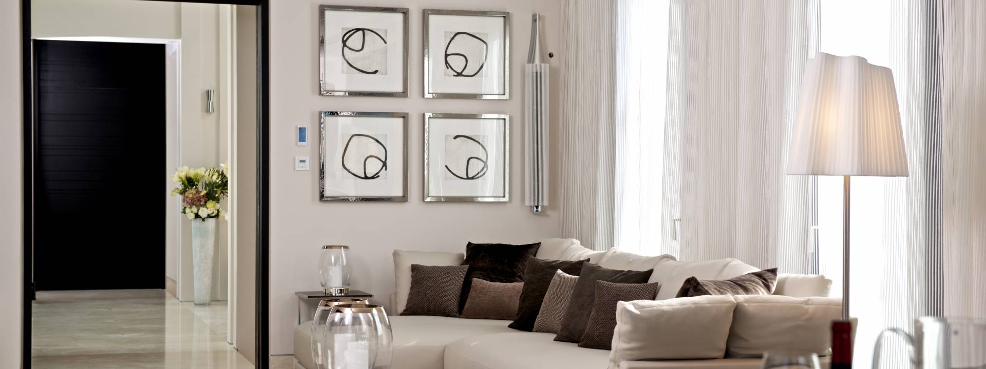 Modern Holiday Villa.  White corner sofa. Taylor interiors.