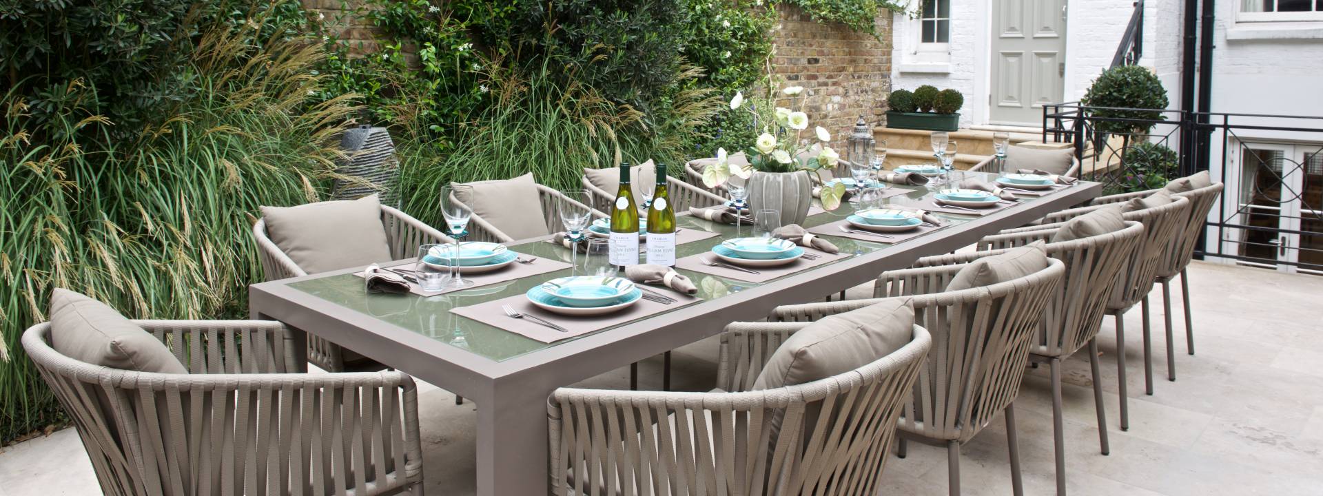 Exquisite Town-house.  Stunning dining table - garden. Taylor Interiors.