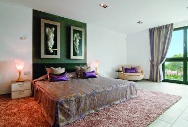 Luxury Minimalist villa.  Modern bedroom.